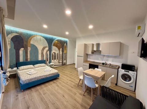 Bed, TV and multimedia, Living room, Photo of the whole room, Seating area, Bedroom, oven, pet friendly, stove, washing machine, dryer