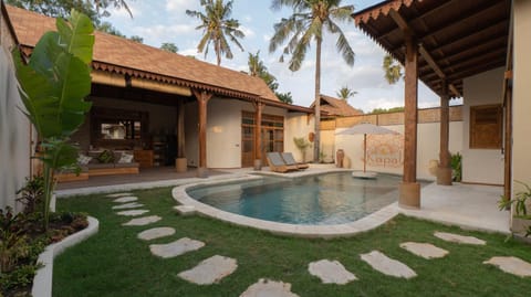 Property building, Patio, Day, Natural landscape, Garden, Garden view, Pool view, Swimming pool