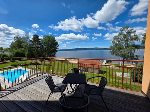 View (from property/room), Balcony/Terrace, Lake view, Pool view, Swimming pool