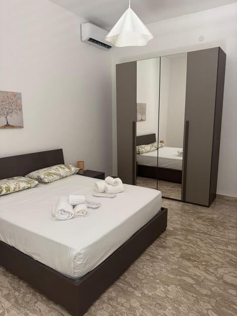 Bed, Photo of the whole room, Bedroom, towels, wardrobe, air conditioner