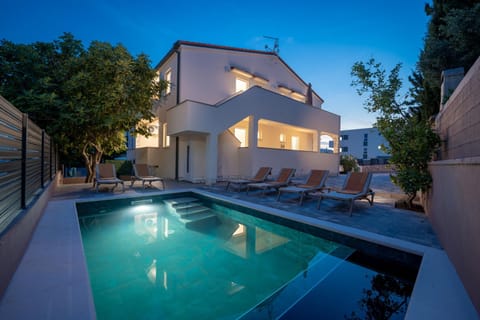 Property building, Night, Swimming pool