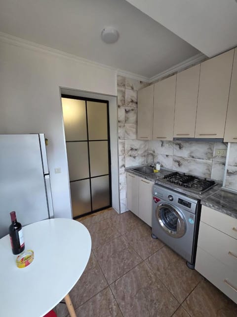 Kitchen or kitchenette, toaster, washing machine