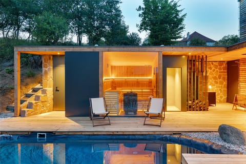 Property building, Natural landscape, Seating area, Pool view, Swimming pool, sunbed