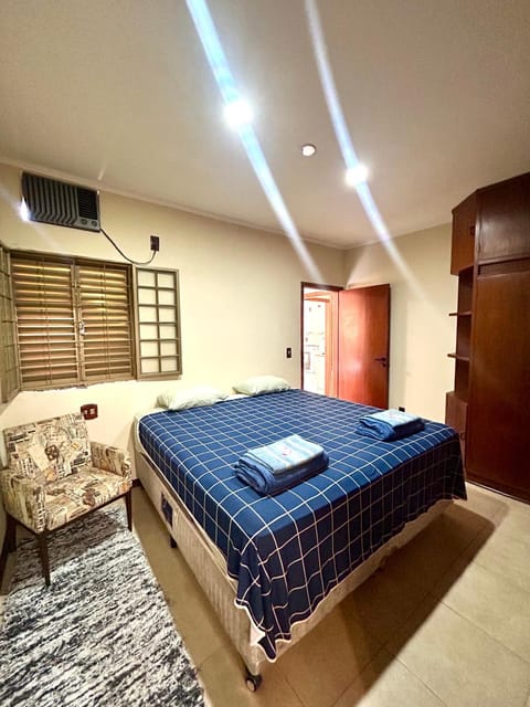 Bed, Photo of the whole room, towels, wardrobe, air conditioner