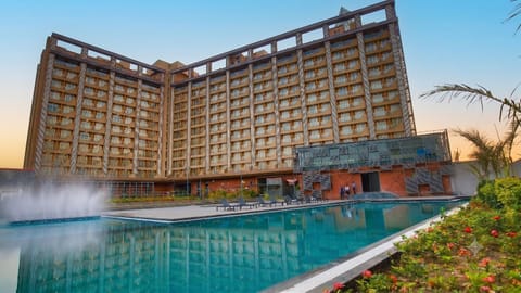 Property building, Facade/entrance, Swimming pool, Sunset