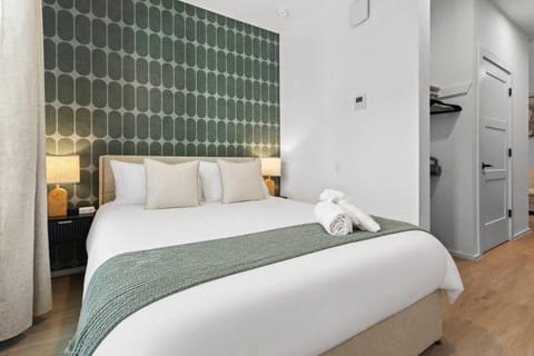 Bed, Photo of the whole room, Bedroom, towels, air conditioner