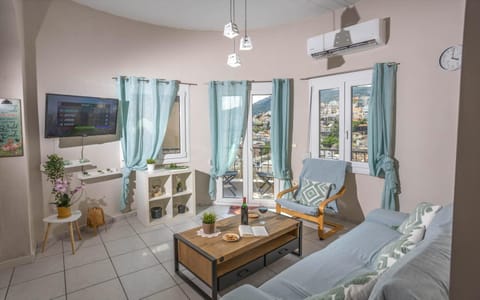 TV and multimedia, Living room, Seating area, air conditioner