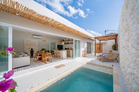 Property building, Patio, Day, Natural landscape, View (from property/room), Living room, Seating area, Pool view, Swimming pool, sunbed