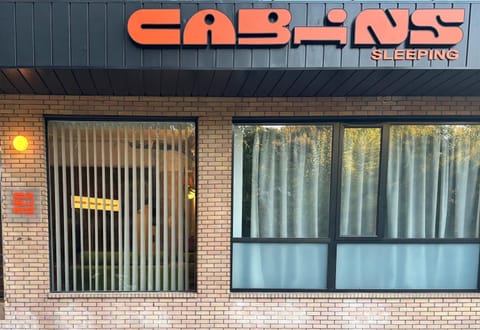 Property building, Facade/entrance, Day, Property logo or sign, Text overlay