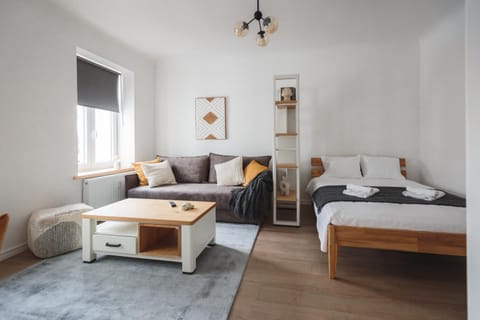 Bed, Living room, Seating area, Bedroom, towels