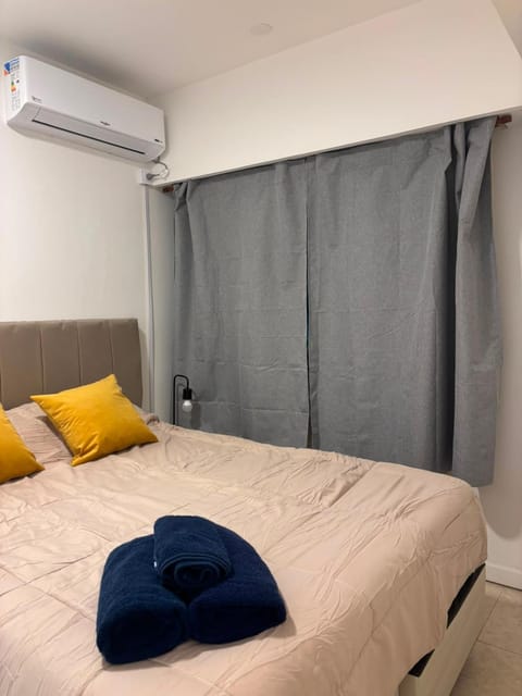Bed, Photo of the whole room, Bedroom, towels, air conditioner