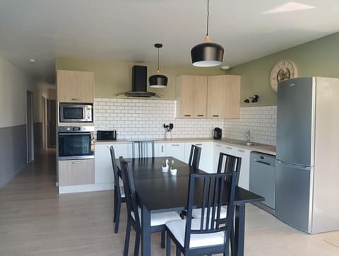 Dining area, dishwasher, oven, toaster
