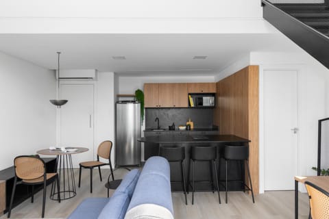 Kitchen or kitchenette, Living room, Seating area, Dining area