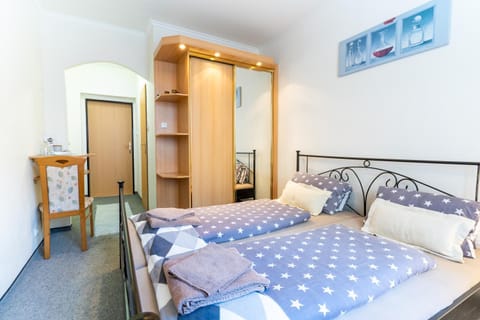 Bed, Photo of the whole room, Bedroom, bunk bed, towels, wardrobe