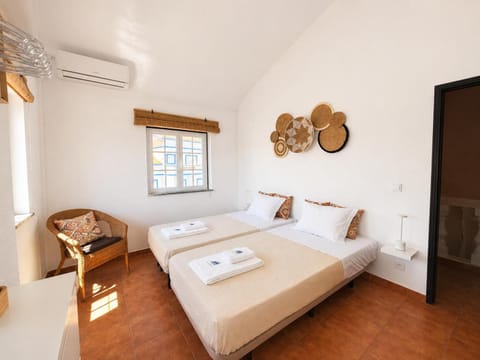 Bed, Bedroom, storage, towels, air conditioner