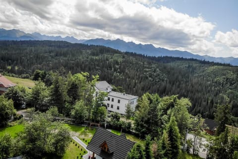 Property building, Nearby landmark, Spring, Day, Natural landscape, Bird's eye view, Mountain view