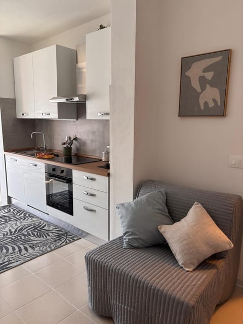 Kitchen or kitchenette, Living room, stove