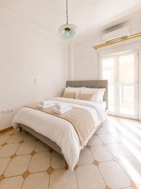 Bed, Photo of the whole room, Bedroom, hair dryier, towels, wardrobe, air conditioner