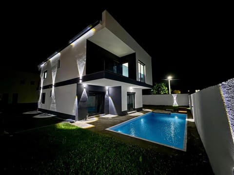 Property building, Night, Pool view, Swimming pool