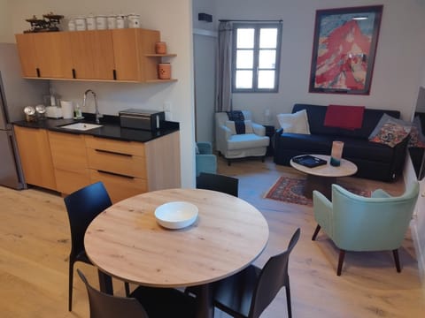 Kitchen or kitchenette, Living room, Dining area, toaster