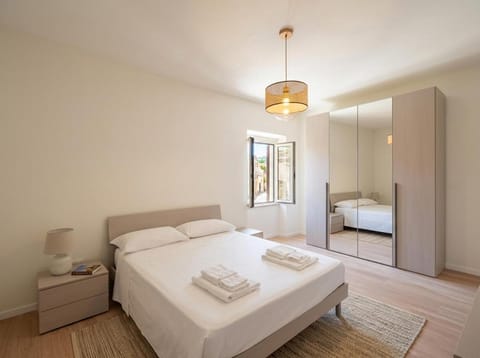 Bed, Photo of the whole room, Bedroom, towels, wardrobe
