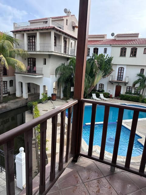 Property building, Patio, Day, View (from property/room), Balcony/Terrace, Pool view, Swimming pool, sunbed