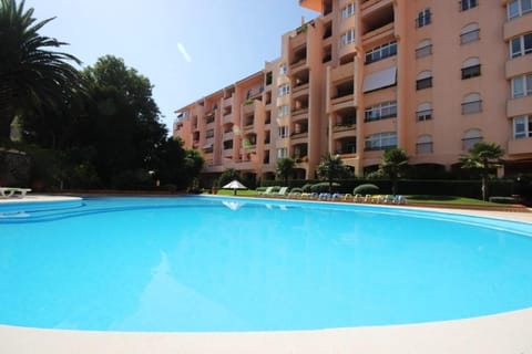 Property building, Pool view, Swimming pool, sunbed