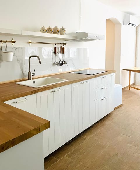 Kitchen or kitchenette, stove, kitchen