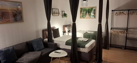 Bed, Night, Living room, Photo of the whole room, Seating area, Bedroom, internet, towels, wardrobe