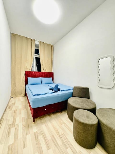 Bed, Seating area, Bedroom