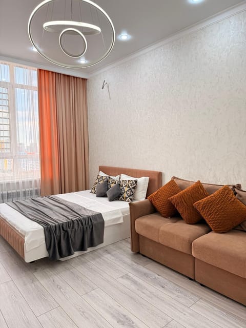 Toilet, Bed, Bathroom, Living room, Photo of the whole room, Seating area, Bedroom, Bath