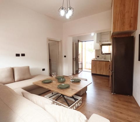 Kitchen or kitchenette, Living room, Seating area, Dining area