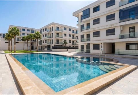 Property building, Day, Pool view, Swimming pool
