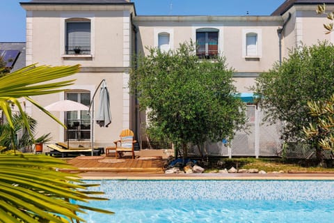 Property building, Living room, Swimming pool