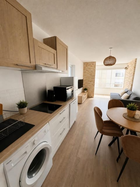 Kitchen or kitchenette, Living room, oven, stove, washing machine