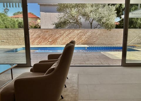 Living room, Seating area, Pool view, Swimming pool
