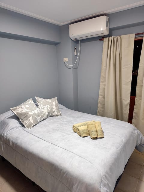 Bed, Bedroom, towels, air conditioner