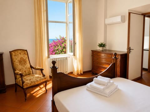 Bed, Photo of the whole room, Bedroom, towels, air conditioner