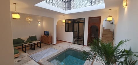 Living room, Seating area, Pool view, Swimming pool