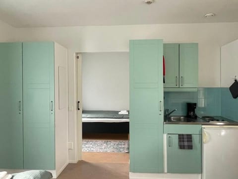 Coffee/tea facilities, Kitchen or kitchenette, furniture, wardrobe