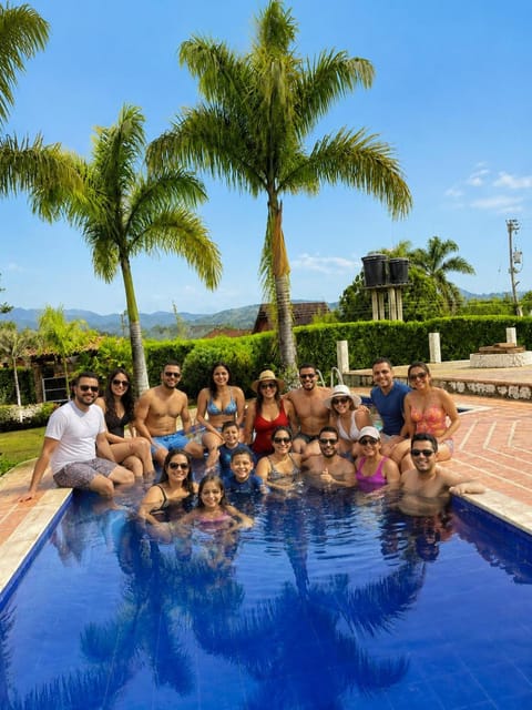 People, Natural landscape, Pool view, Swimming pool, group of guests, Family, sunbed