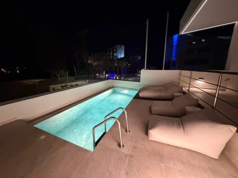 Patio, Night, Balcony/Terrace, Pool view, Swimming pool