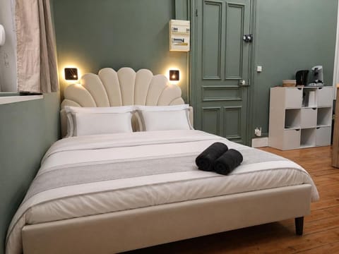 Bed, towels, wardrobe