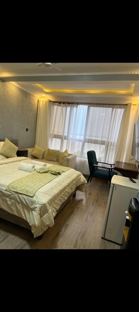 Bed, Seating area, Bedroom