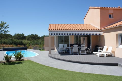 Property building, Living room, Swimming pool