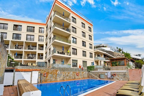 Property building, Patio, Pool view, Swimming pool, Swimming pool