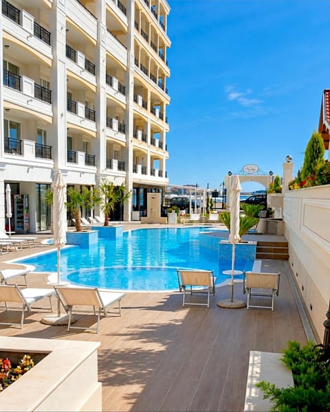 Property building, Day, View (from property/room), Pool view, Swimming pool, sunbed