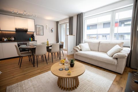 Kitchen or kitchenette, Living room, Seating area, Dining area
