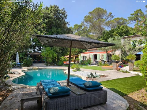 Property building, Patio, Spring, Day, Natural landscape, Garden, Garden view, Pool view, Swimming pool, sunbed