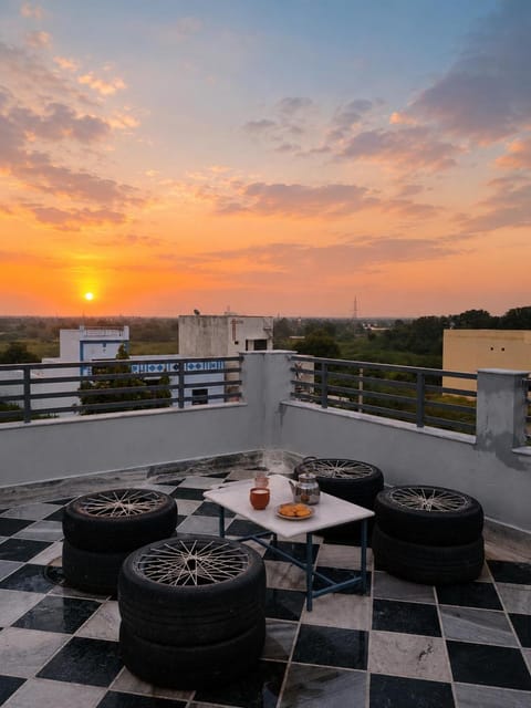 View (from property/room), Seating area, Sunrise